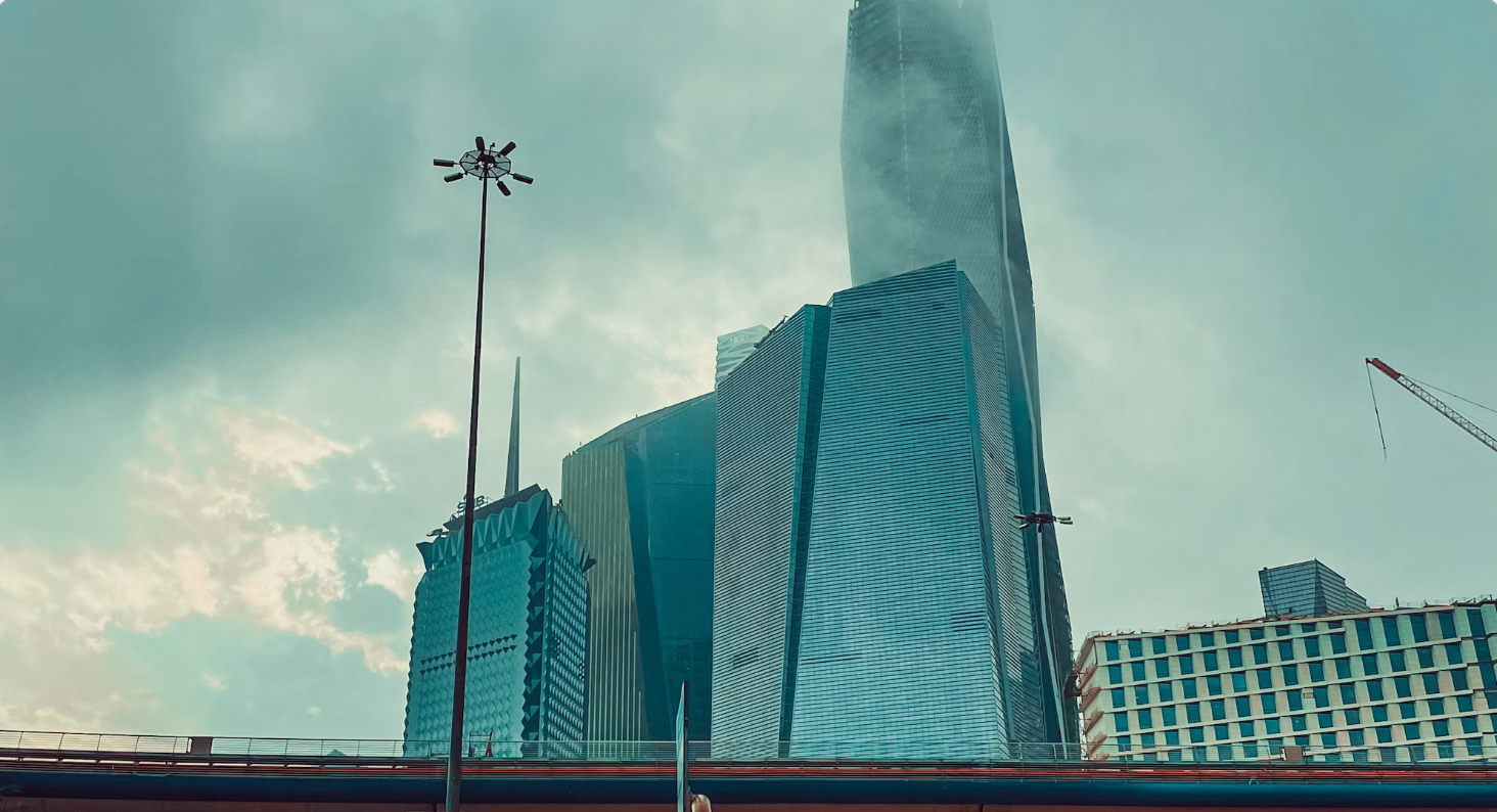 Photo: Mohammed Alqarni / Unsplash — Saudi Arabia's real estate sector
is central to its Vision 2030 tokenization push, with institutional-grade property
as the starting point.