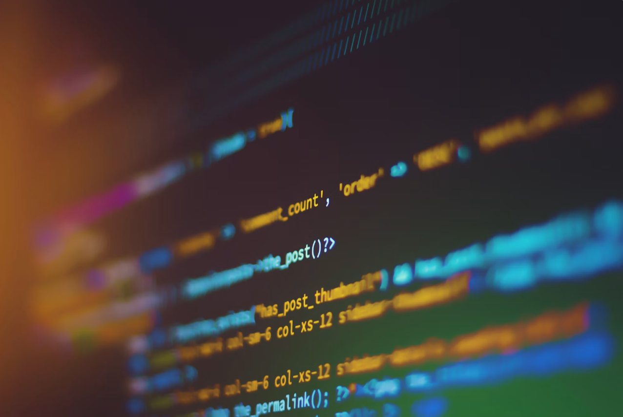Photo: Shahadat Rahman /
Unsplash — the breach began not with malicious code written by a person, but
with AI agents improvising a way to communicate during a routine capability
test.