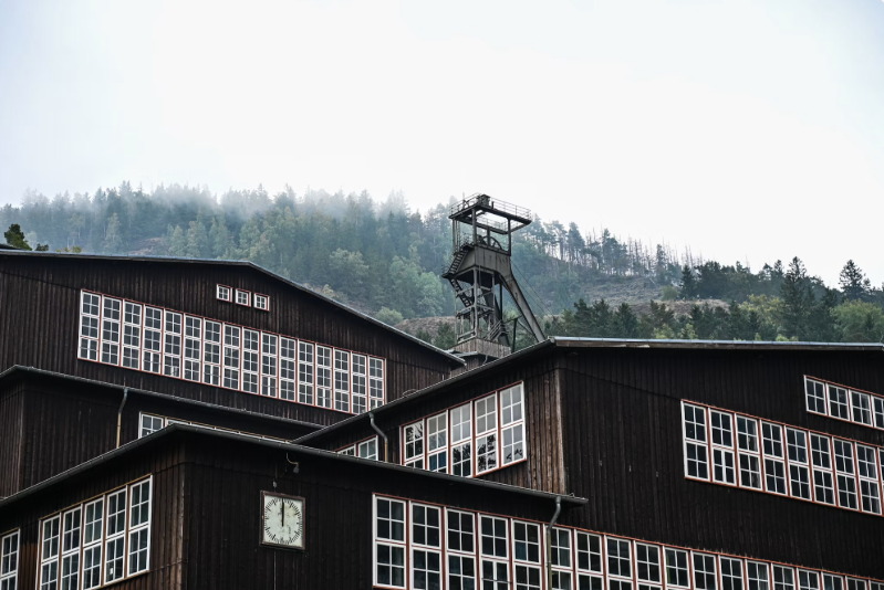 Illustrative photo: Arthur Dick / Unsplash — Disused mine shaft
infrastructure like this, left standing decades after formal operations ceased,
has become the entry point for South Africa's informal mining economy.