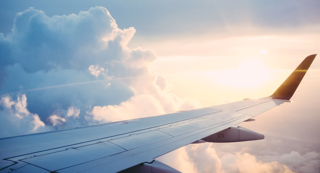 Photo: Ross Parmly /
Unsplash — flight and hotel bookings are among the first tasks agentic AI has
moved from research-only to fully autonomous completion.
