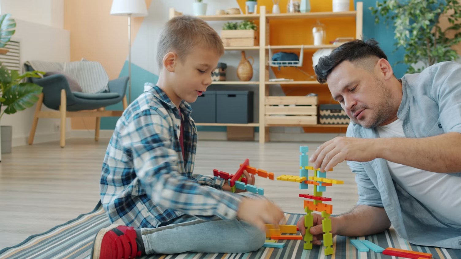 The block tower falls, the
frustration lands for a moment, and then the rebuilding starts again, usually
before an adult would have finished sighing.