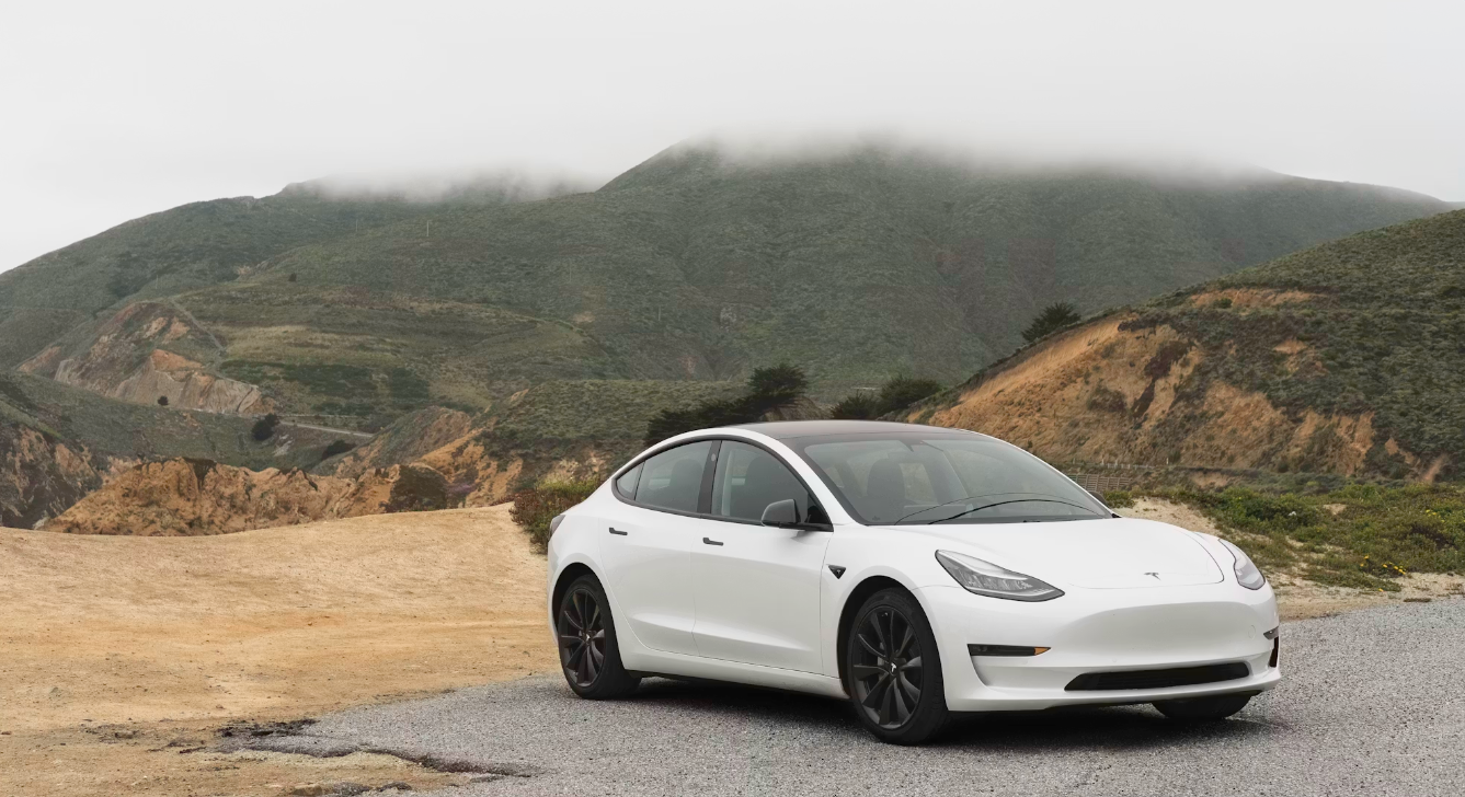 Photo: Unsplash — Tesla's core vehicle business posted its first annual
revenue decline in 2025, even as the company's overall valuation kept climbing
on the strength of its AI and robotics ambitions.
