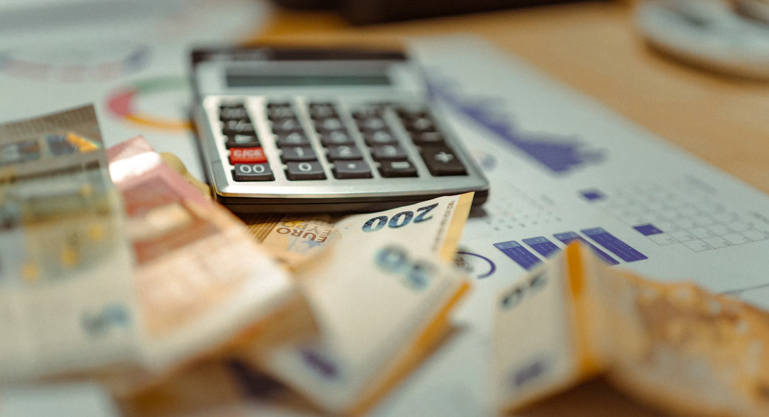 Photo: Jakub Żerdzicki /
Unsplash — running the actual after-tax, after-fixed-costs math on a six-figure
salary tends to produce a far smaller number than the headline figure suggests.