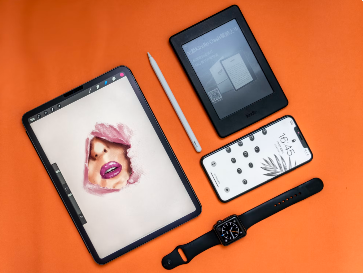 Photo: Alvan Nee / Unsplash — the installed base of
devices like these is the real engine behind Apple's valuation, not any single
product launch.